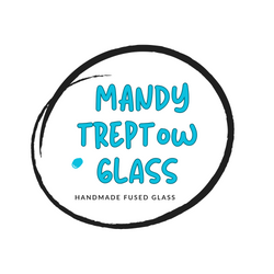 A circular logo with a hand-drawn black border and turquoise text reading 'MANDY TREPTOW GLASS' on a white background, with smaller text below reading 'HANDMADE FUSED GLASS'.
